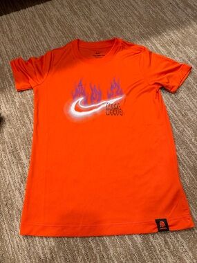 Nike Orange T-Shirt with White Swoosh and Purple Flame